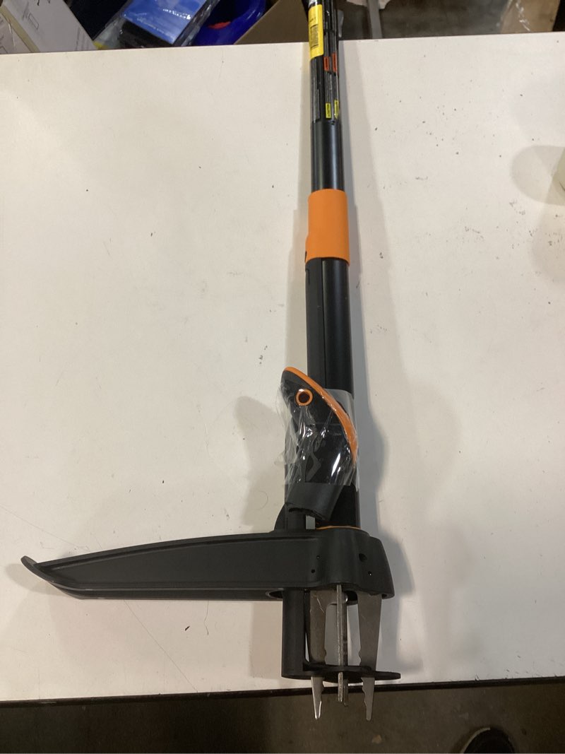 Condition photo showing As Is for fiskars 39.25 in. stainless steel weeder aluminum handle  black and orange