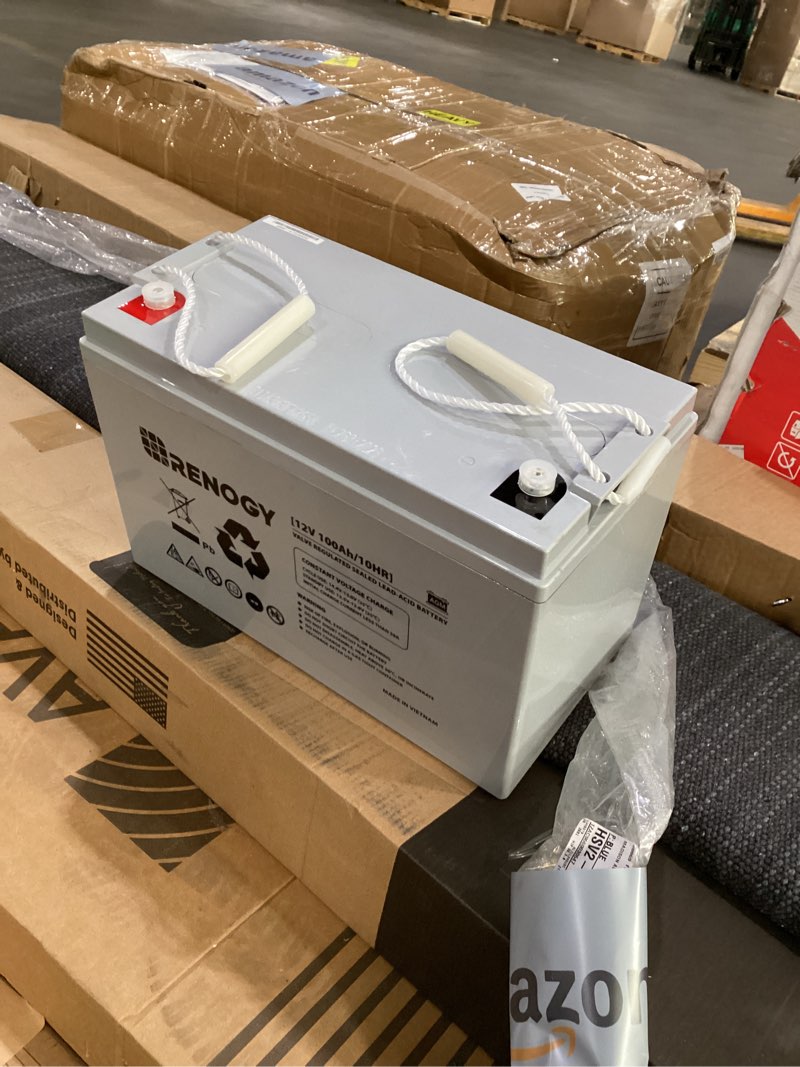 Condition photo showing New/Like New for renogy deep cycle agm 12 volt 100ah battery, 3% self-discharge rate, 1100a max discharge current, safe charge appliances for rv, camping, cabin, marine and off-grid system, maintenance-free