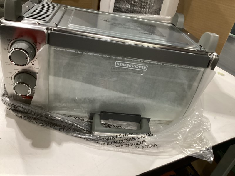 Condition photo showing Good Condition for BLACK+DECKER Crisp ‘N Bake Air Fry 4-Slice Toaster Oven  Silver & Black  Fits 9 Inch Pizza  .35 Cubic Feet