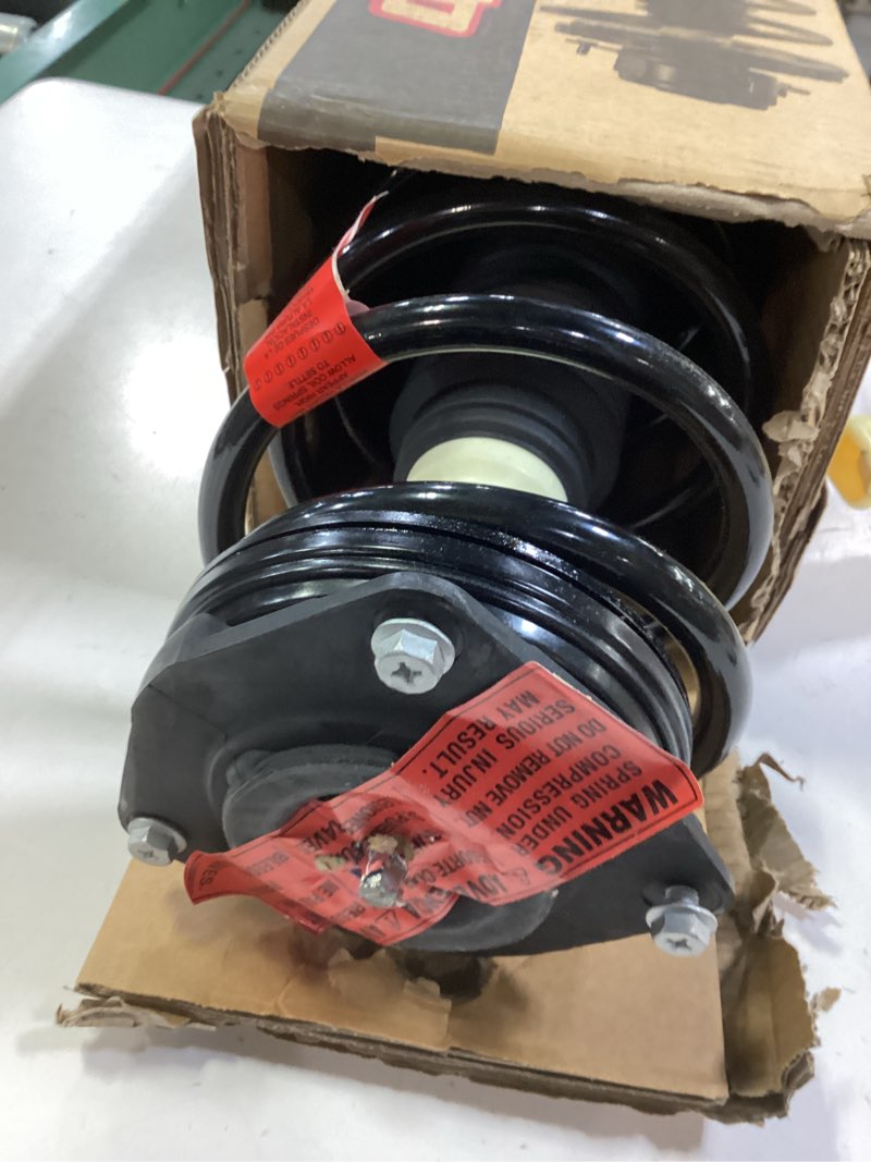 Condition photo showing Good Condition for Monroe Quick-Strut 172378 Suspension Strut and Coil Spring Assembly for Nissan Sentra