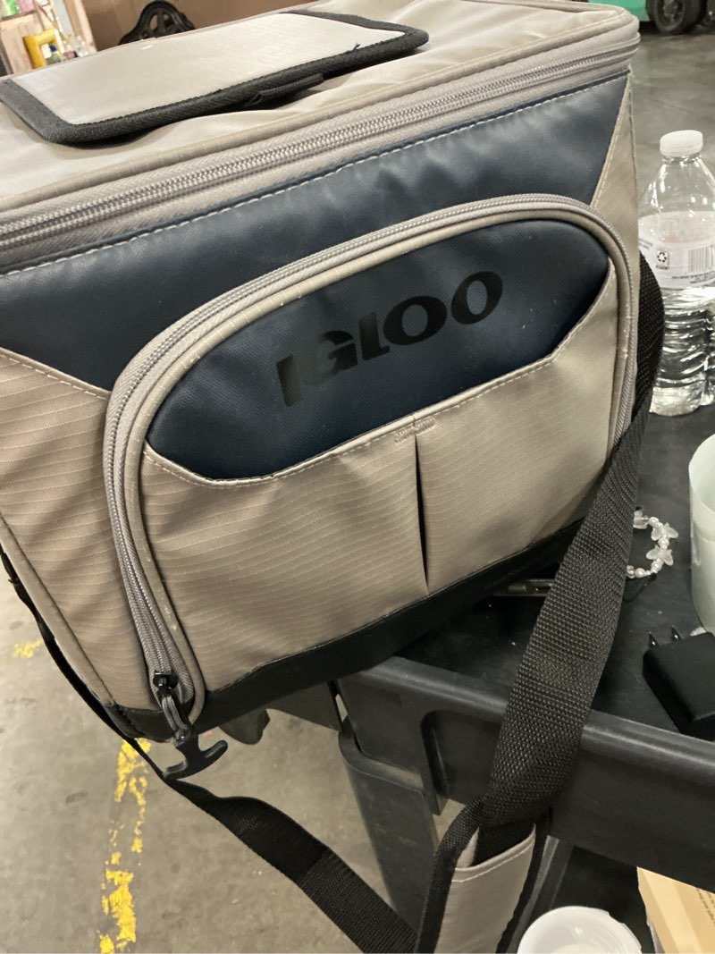 Condition photo showing As Is for igloo trek 18 can capacity softside cooler with hard liner, sandstone tan