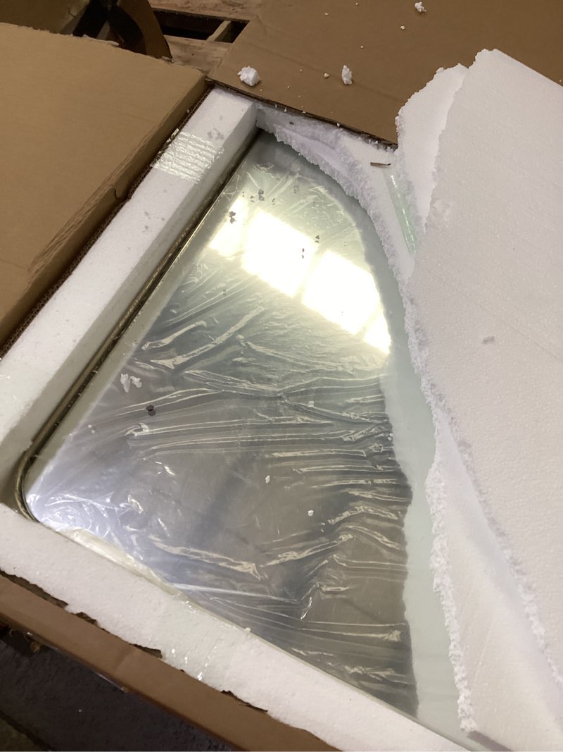 Condition photo showing New/Like New for ANDY STAR 36”x48”Gold Bathroom Mirror for Wall, Brushed Brass Metal Rounded Corner Rectangle Mirror, Wall Mirror in Stainless Steel Metal Frame, 1”Deep Set Design Hangs Horizontal Or Vertical Gold 48"L x 36"W