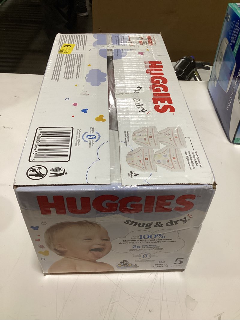 Condition photo showing New/Like New for Huggies Size 5 Diapers, Snug & Dry Baby Diapers, Size 5 (27+ lbs), 84 Count, Packaging May Vary Size 5 84