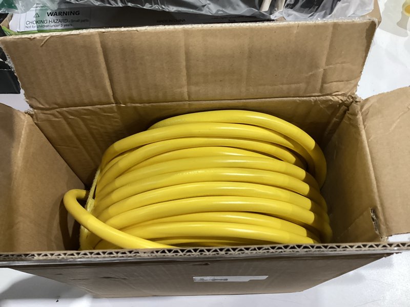 Condition photo showing Good Condition for POWGRN 100 ft 12/3 Outdoor Extension Cord Waterproof Heavy Duty with Lighted Indicator End 12 Gauge 3 Prong, Flexible Cold-Resistant Long Power Cord Outside, 15Amp 1875W SJTW Yellow ETL Listed 100FT 12/3 Extension Cord Yellow