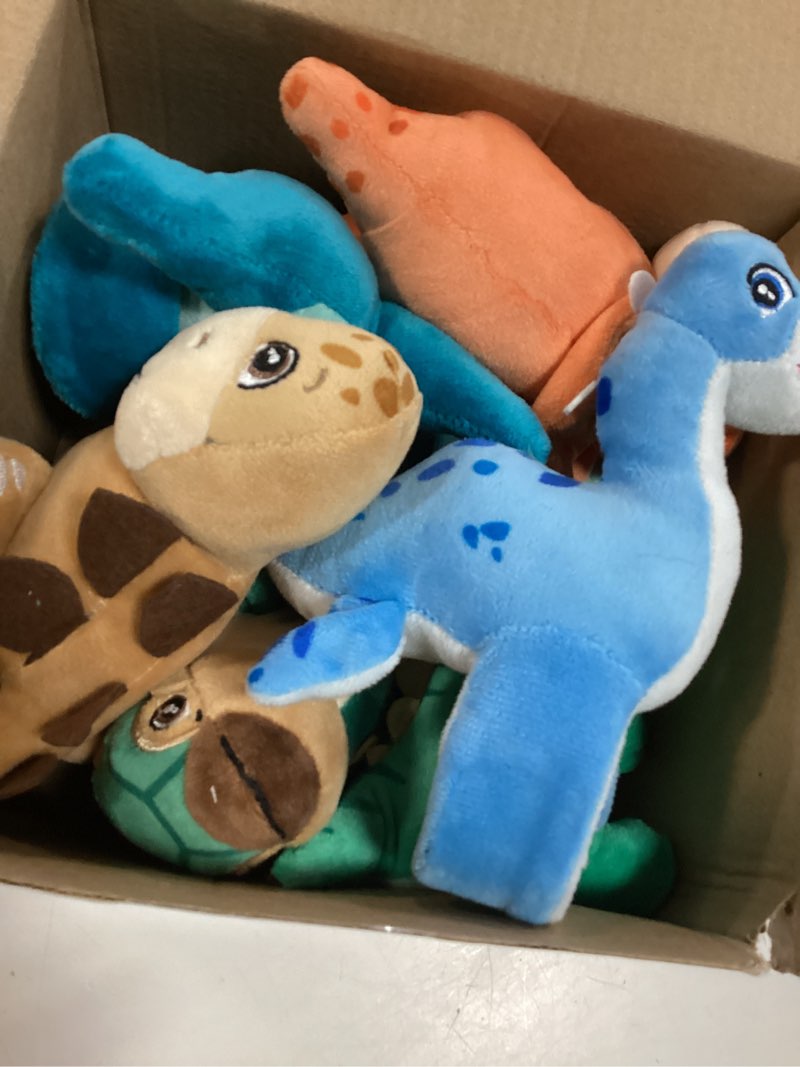 Condition photo showing New/Like New for liliful 7 pack kids plush gifts stuffed animal cat slap bracelets, operation christmas 8 inch wrist cute snap bracelet birthday for boys girls child bulk item pet adoption party favors(dinosaur)