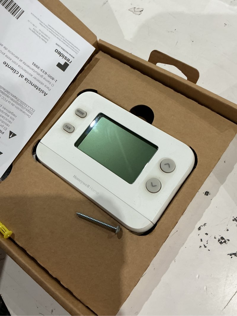 Condition photo showing As Is for x1n non-programmable thermostat, single-stage, 1-heat/1-cool