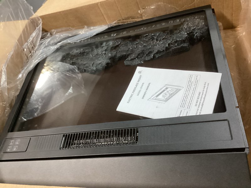 Condition photo showing As Is for Efiretric® Adam Electric Fireplace Insert with Front Trim Kit, 23" W x 17" H (EF447) with Front Trim Kit, 1500W Heater, Remote Control and Timer