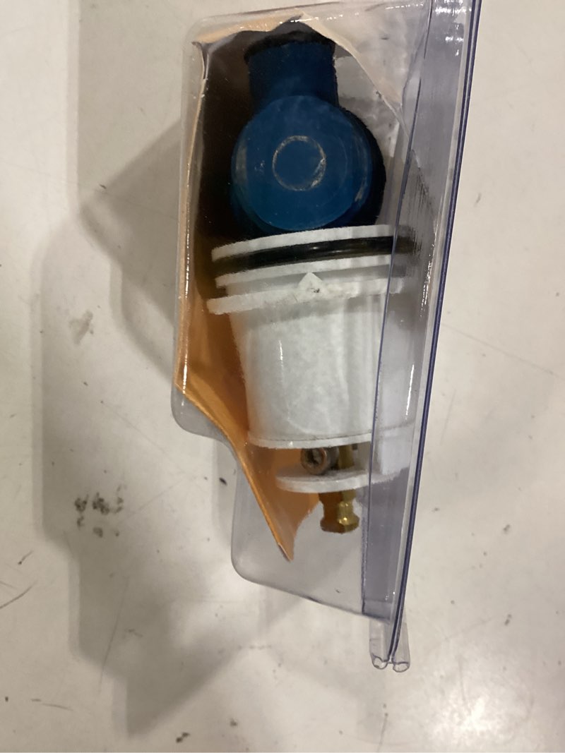 Condition photo showing As Is for danco hot and cold faucet cartridge for delta
