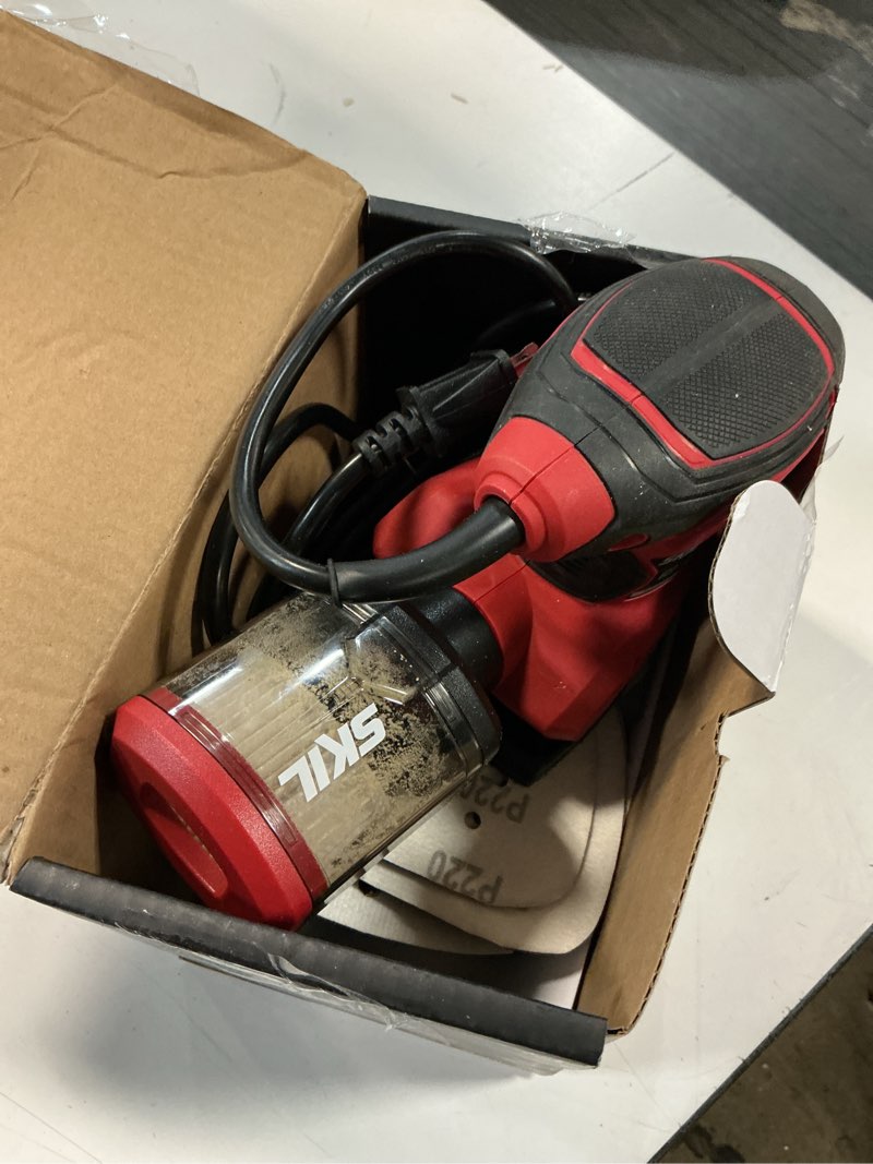 Condition photo showing As Is for skil corded multi-function detail sander with micro-filter dust box 3 additional attachments & 12pc sanding sheet- sr232301 one size multi-function detail sander