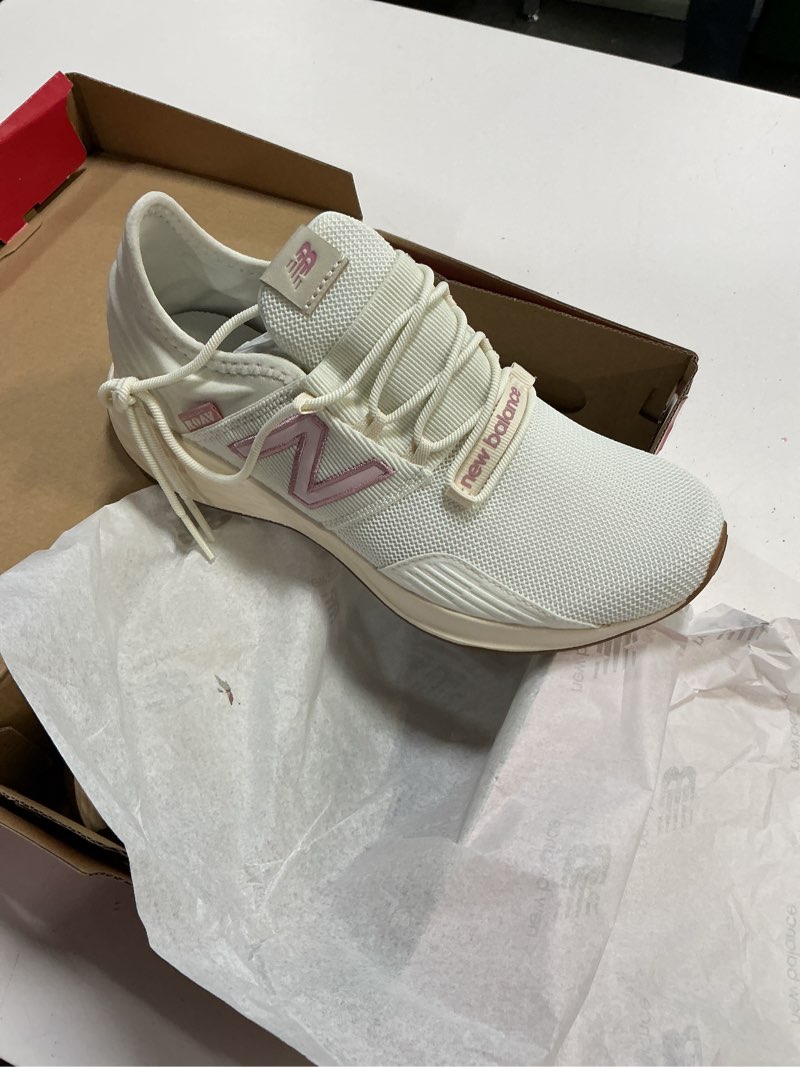 Condition photo showing New/Like New for new balance kid's fresh foam roav v1 lace-up running shoe, sea salt/pink taffy/rose sugar, 4.5 m big