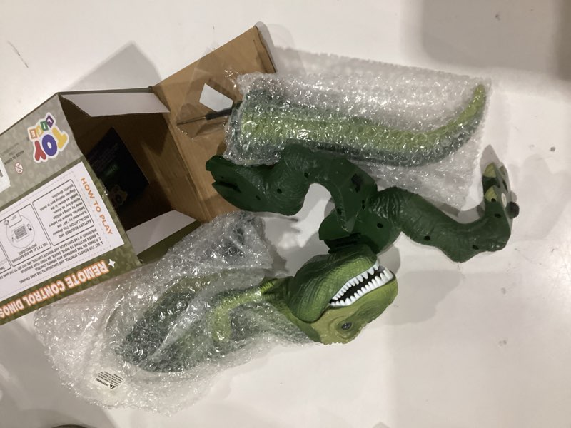Condition photo showing As Is for steam life remote control dinosaur toys for kids 3-5 4-7 8-12, electronic walking & dancing robot dino with spray, lights & roar, interactive birthday gifts for boys girls green