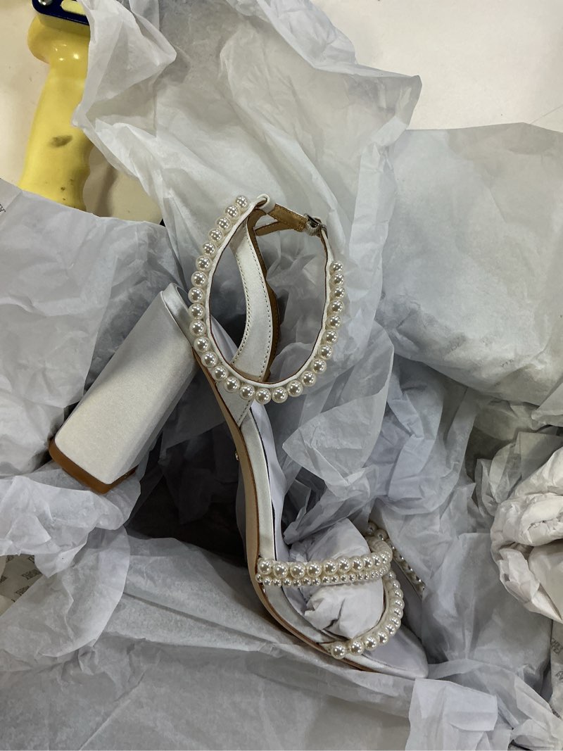 Condition photo showing New/Like New for (Size 10)Badgley Mischka womens Feisty Soft White Satin