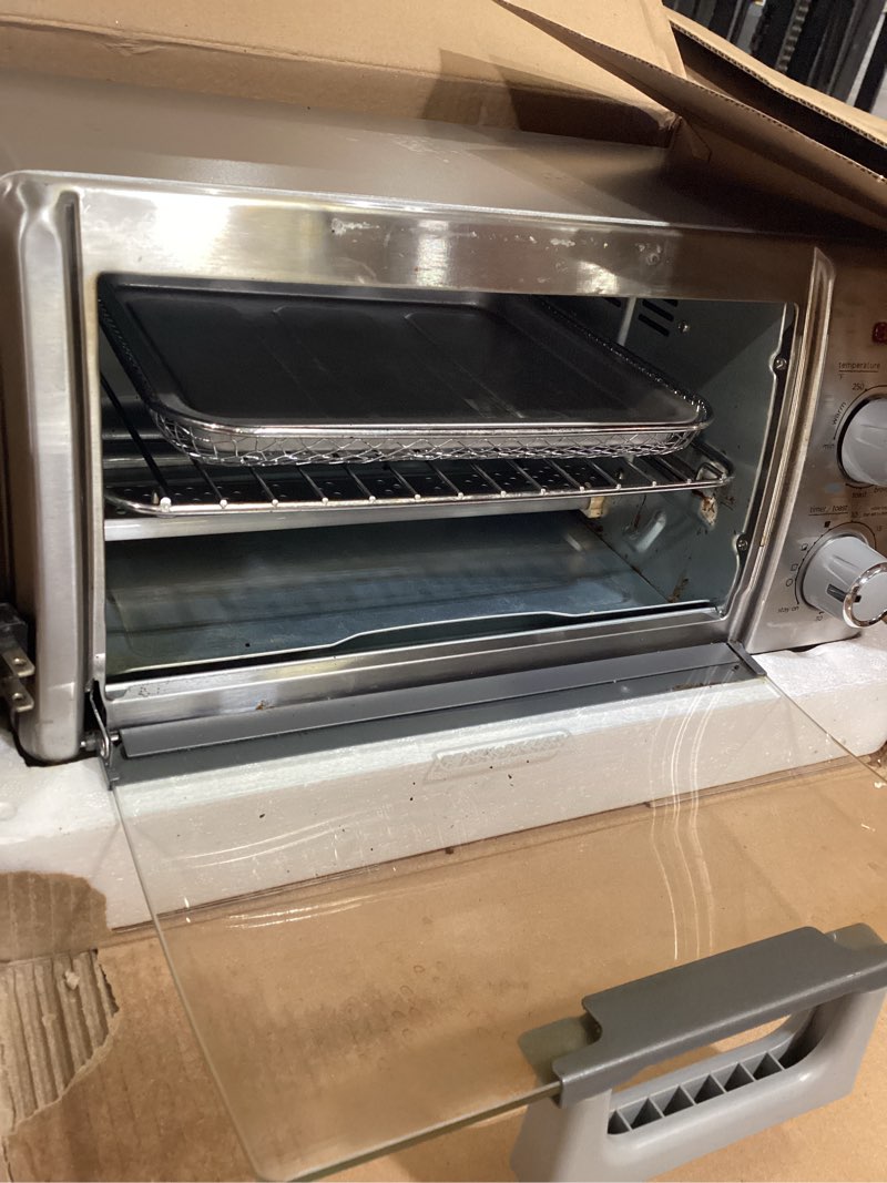 Condition photo showing As Is for black+decker 4-slice toaster oven, to1745ssg-1a, even toast, 4 cooking functions bake, broil, toast and keep warm, removable crumb tray, timer