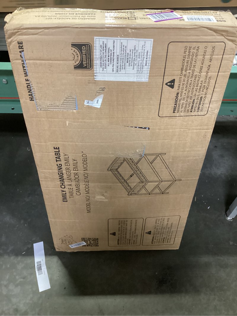 Condition photo showing New/Like New for dream on me emily changing table in steel grey, comes with 1" changing pad, features two shelves, portable changing station, made of sustainable new zealand pinewood
