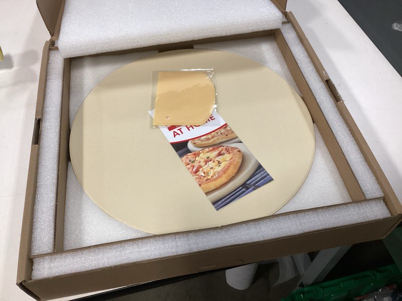 Condition photo showing New/Like New for Unicook Pizza Stone for Grill Oven, 15 Inch Round Baking Stone, Heavy Duty Cordierite Bread Cooking Pan, Thermal Shock Resistant, Ideal for Making Crisp Crust Pizza, Bread and More, Includes Scraper 15" Round