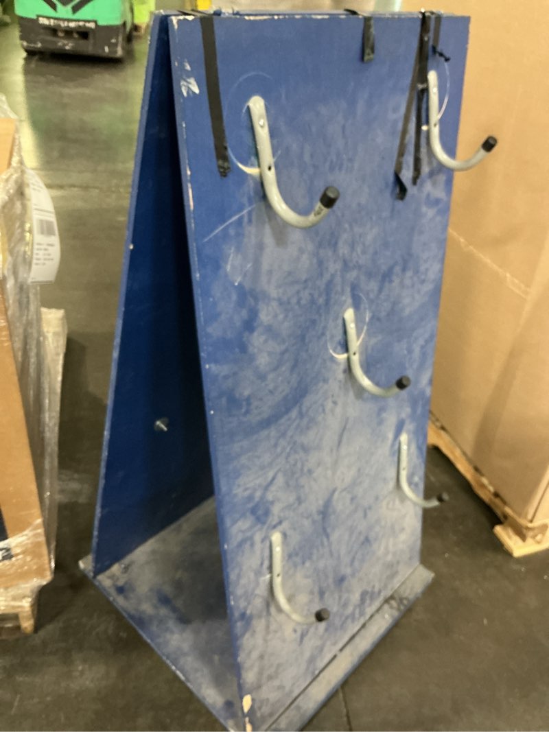 Condition photo showing As Is for vertival rack whith wheels  blue 24”x50”