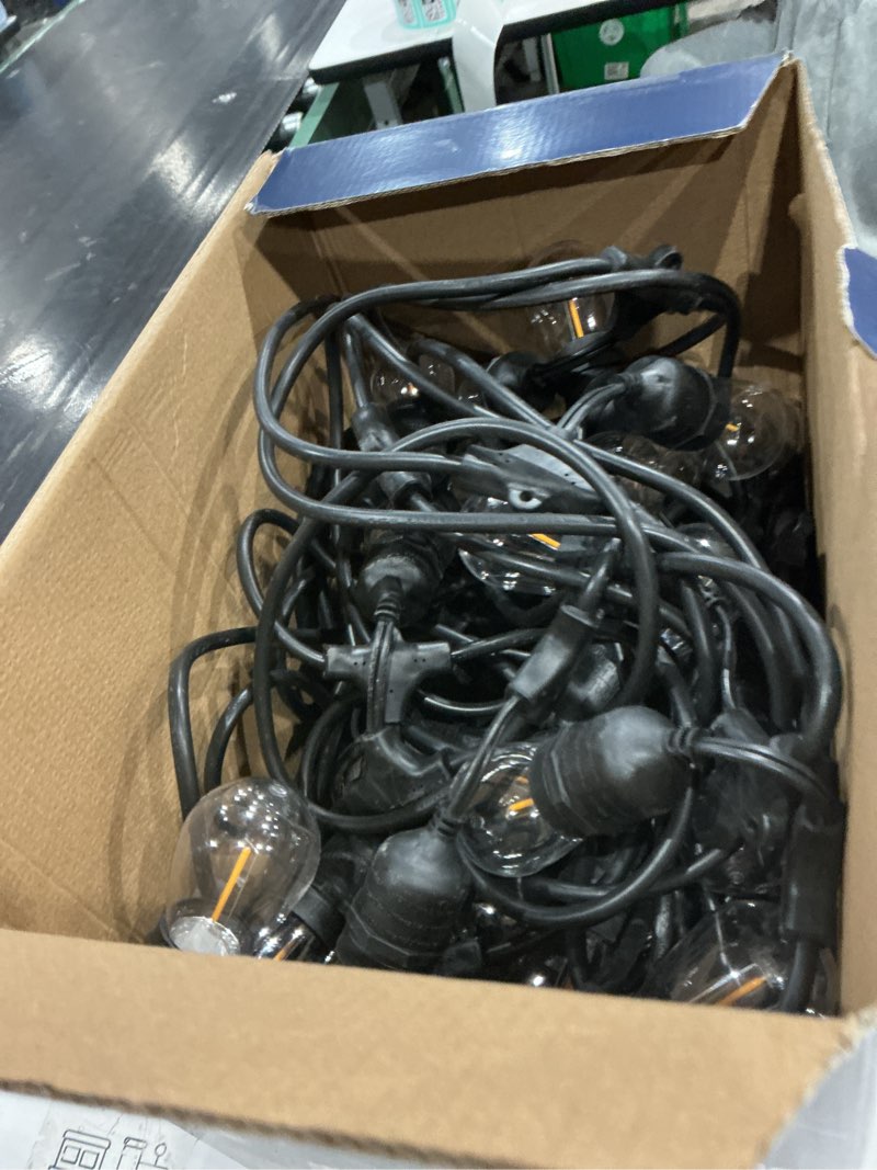 Condition photo showing As Is for harbor breeze 96-ft plug-in black indoor/outdoor string light with 48 white -light led edison bulbs