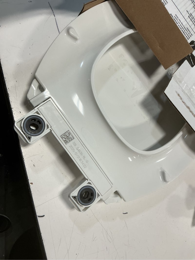 Condition photo showing As Is for kohler 4636-rl-0 cachet readylatch elongated toilet seat slow close, soft close toilet seat quiet lid, contoured grip-tight bumpers installation hardware, apartment essentials, white white elongated ready latch