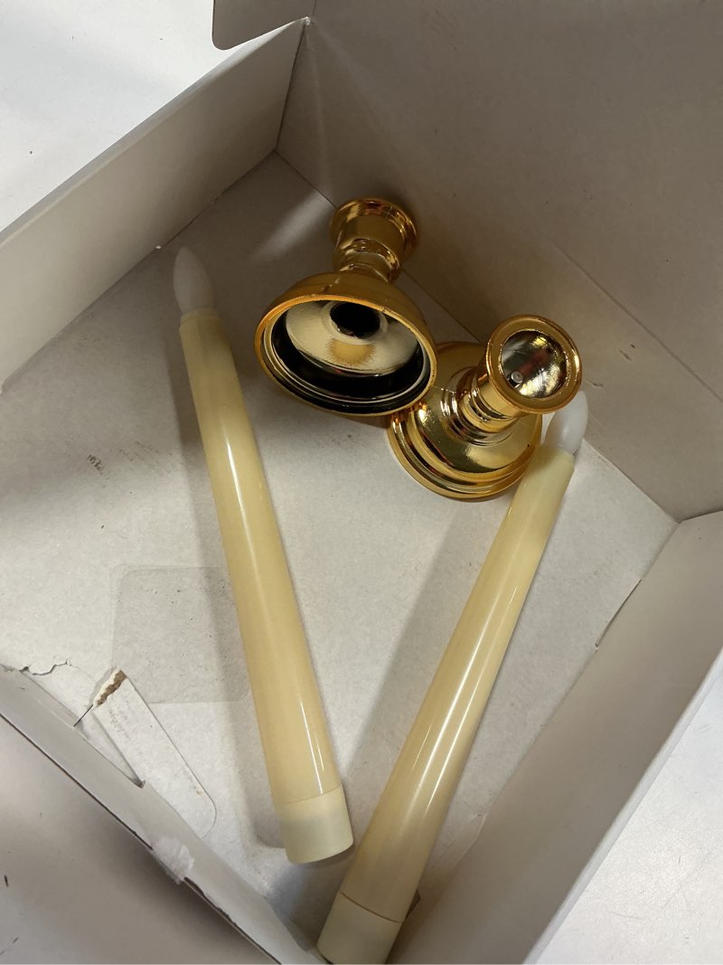 Condition photo showing As Is for (Only 2 pcs) Raycare 9 Pcs Flameless Taper Candles, Battery Operated Candlesticks Require 2 AAA Batteries (NOT Included),6.7 Inches Taper Candlesticks with Holders, Flickering LED Window Candles with Remote Timer Ivory