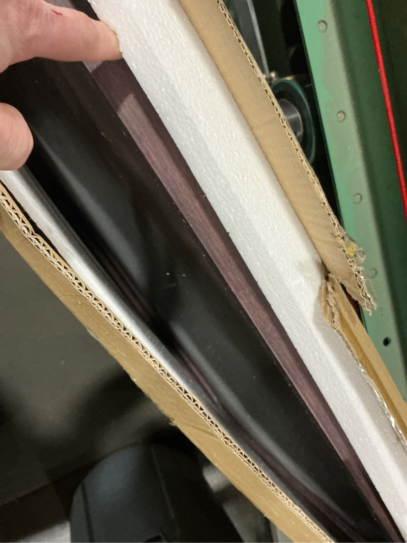 Condition photo showing Good Condition for 24x36 Poster Frame Walnut Brown with Black Back Board, Curved Extra Wide Edges, Wooden Vintage Style Poster Frame 24x36 inches for Wall Decor. Walnut Brown 24x36