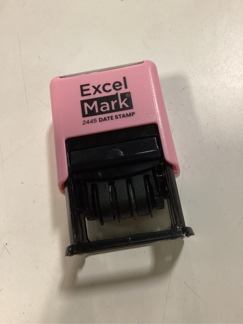 Condition photo showing As Is for ExcelMark 2445 Date Stamp with Text - Blue and Red Ink (Pink Mount, Entered) Pink Mount Entered
