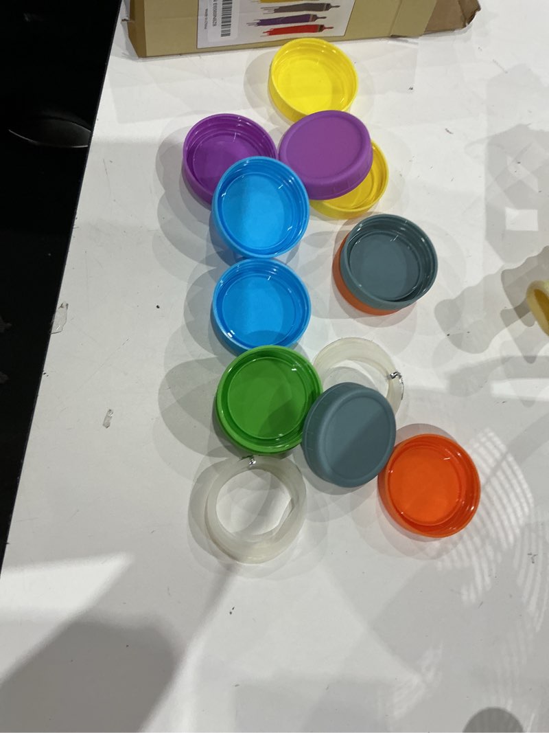 Condition photo showing Good Condition for 12 pack regular mouth mason jar lids for ball, kerr and more - multicolor plastic storage caps for mason jars, canning jars - leakproof, dishwasher safe & food grade