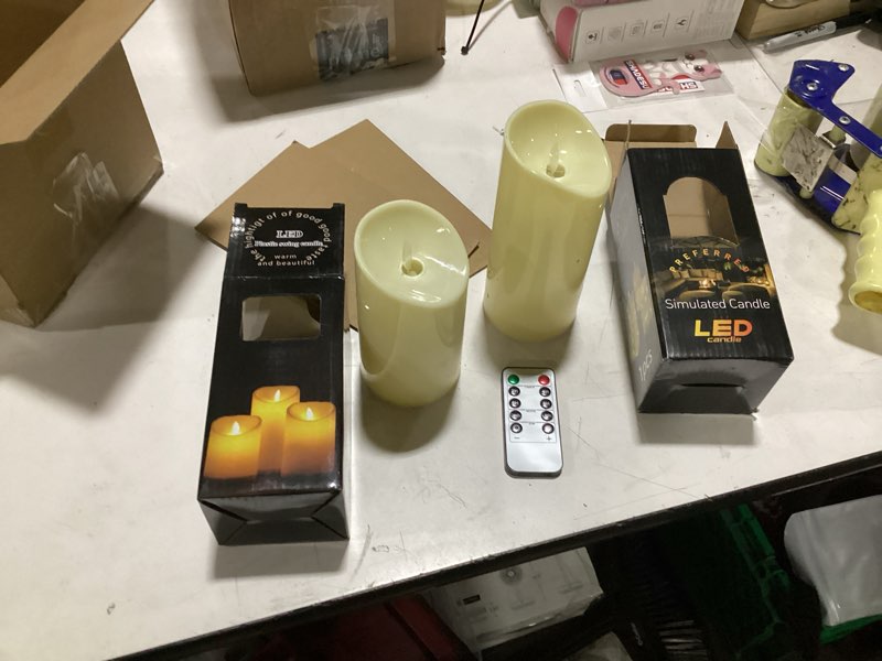 Condition photo showing New/Like New for **similar to** alaza bright yellow flickering flameless candles battery operated with remote timer,tea light candles led pillar votive set of 2 for outdoor indoor decorations 3\" x3.9\" small