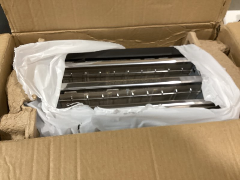 Condition photo showing Good Condition for elite gourmet ect-3100 long slot 4 slice toaster, reheat, 6 toast settings, defrost, cancel functions, built-in warming rack, extra wide slots for bagels & waffles, stainless steel & black 4 slice matte black