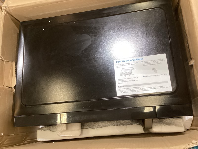 Condition photo showing Good Condition for farberware 1.1 cu. ft. countertop microwave oven – 1000 watts power, auto cook settings, defrost, easy clean and child safety lock - stainless