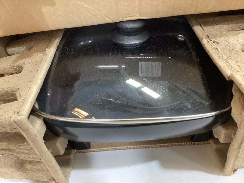 Condition photo showing As Is for amazon basics electric skillet and frying pan with glass lid, nonstick ceramic coating, cool-touch handles, adjustable heat, 15.74 x 11.81 x 6.69 inch, black