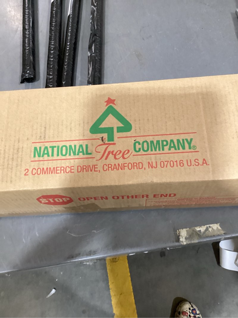 Condition photo showing New/Like New for national tree company 9 ft pre-lit crestwood spruce artificial christmas garland, christmas decoration with glitter, pinecones, red berries, 50 clear lights, 180 tips, green plug in tree
