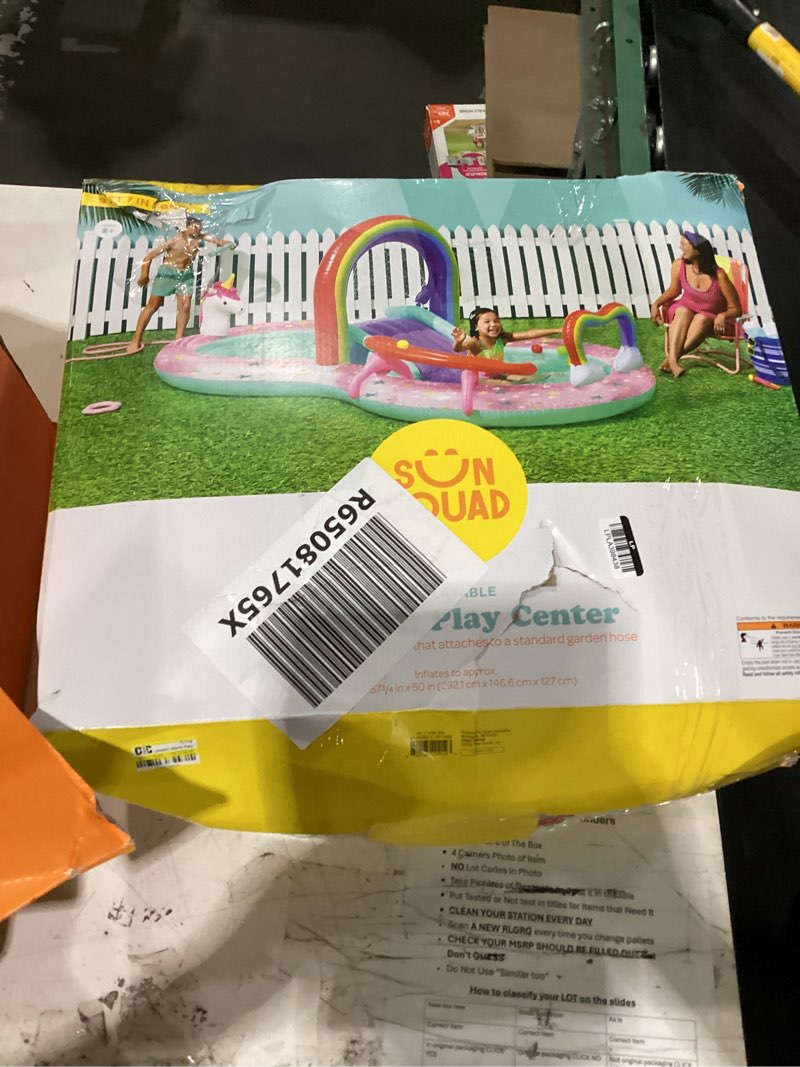 Condition photo showing As Is for unicorn world paly center inflatable water park - sun squad™