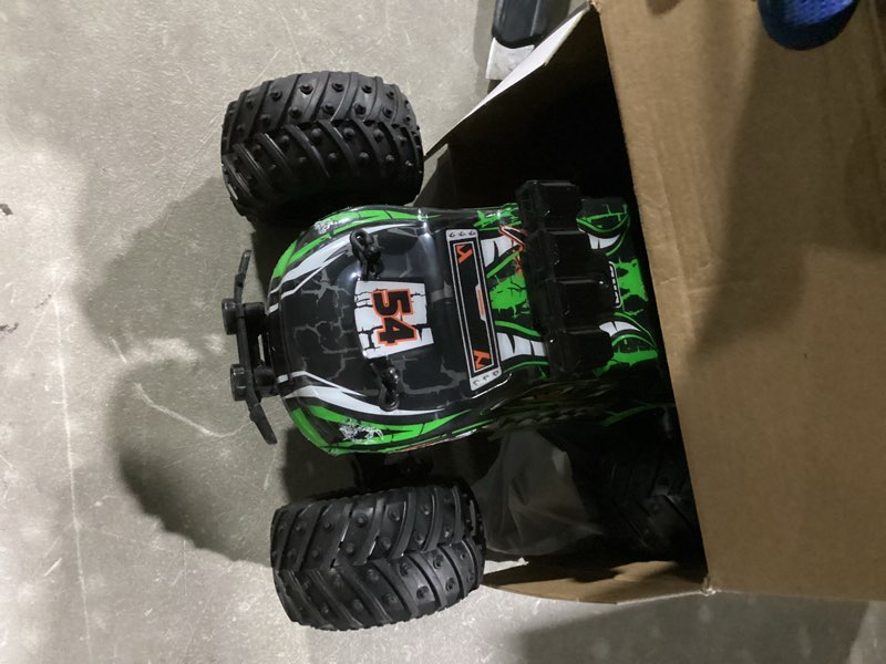 Condition photo showing Good Condition for comius sharp 20km/h remote control monster truck remote control car with 2 headlights and 2 batteries, 2.4ghz dinosaur rc truck off-road for kids ages 6 7 8 9 10 11 12 years old