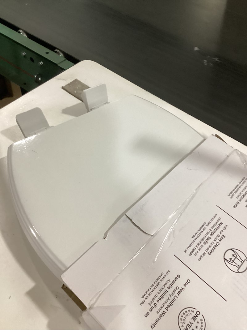 Condition photo showing Good Condition for american standard moments wood white elongated soft close toilet seat