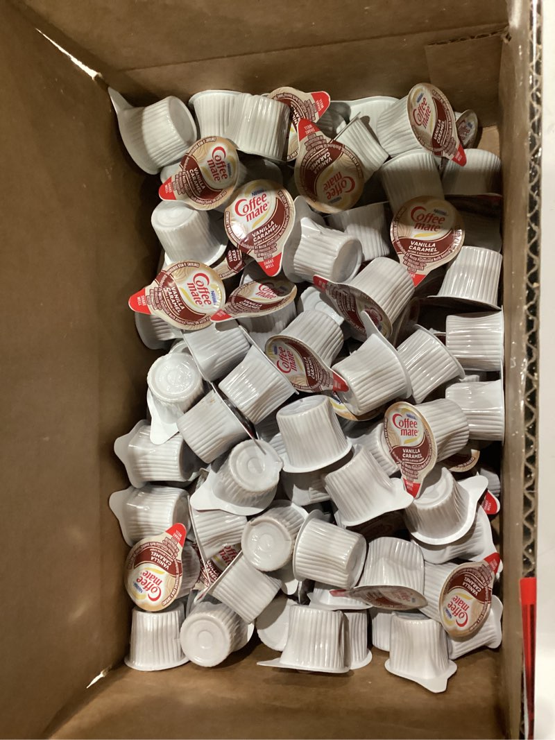 Condition photo showing New/Like New for Similar, vanilla caramel. Nestle Coffee mate Coffee Creamer, Irish Creme, Concentrated Liquid Creamer Singles, Non Dairy, No Refrigeration, 0.375 fl oz Tubs (Pack of 180)