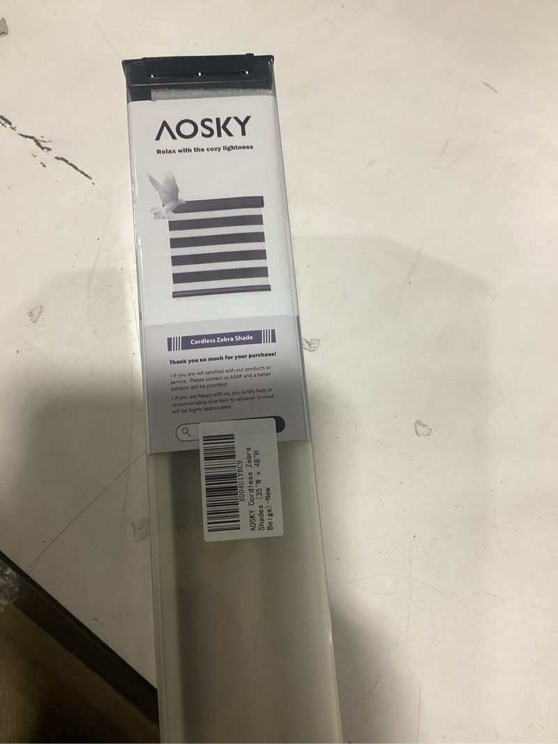 Condition photo showing New/Like New for AOSKY Cordless Zebra Blinds for Windows Pull Down Roller Window Shades Dual Layer Light Filtering Privacy for Day and Night, Free-Stop Door Shades for Home Easy to Install (35" W X 48" H?Beige) 35"W x 48"H Beige