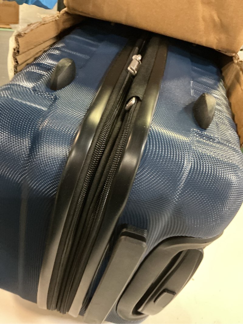Condition photo showing Good Condition for Amazon Basics 21" Hardside Carry-On Luggage, Hardshell Suitcase With Wheels, Expandable For Up to 25% More Space, With Scratch-Resistant Surface, Four Multi-directional Wheels, Navy Blue Navy Blue Carry-On