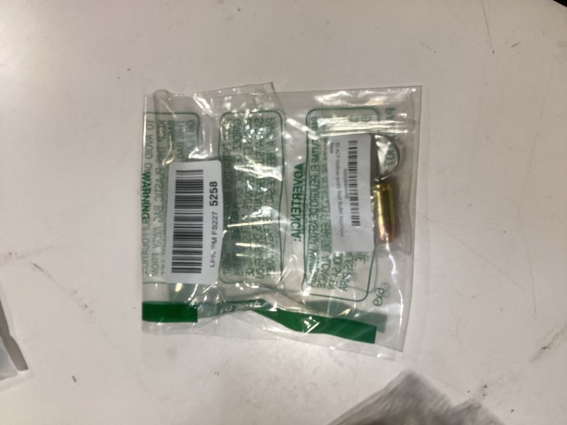 Condition photo showing New/Like New for 45 acp hollow-point real bullet keychain
