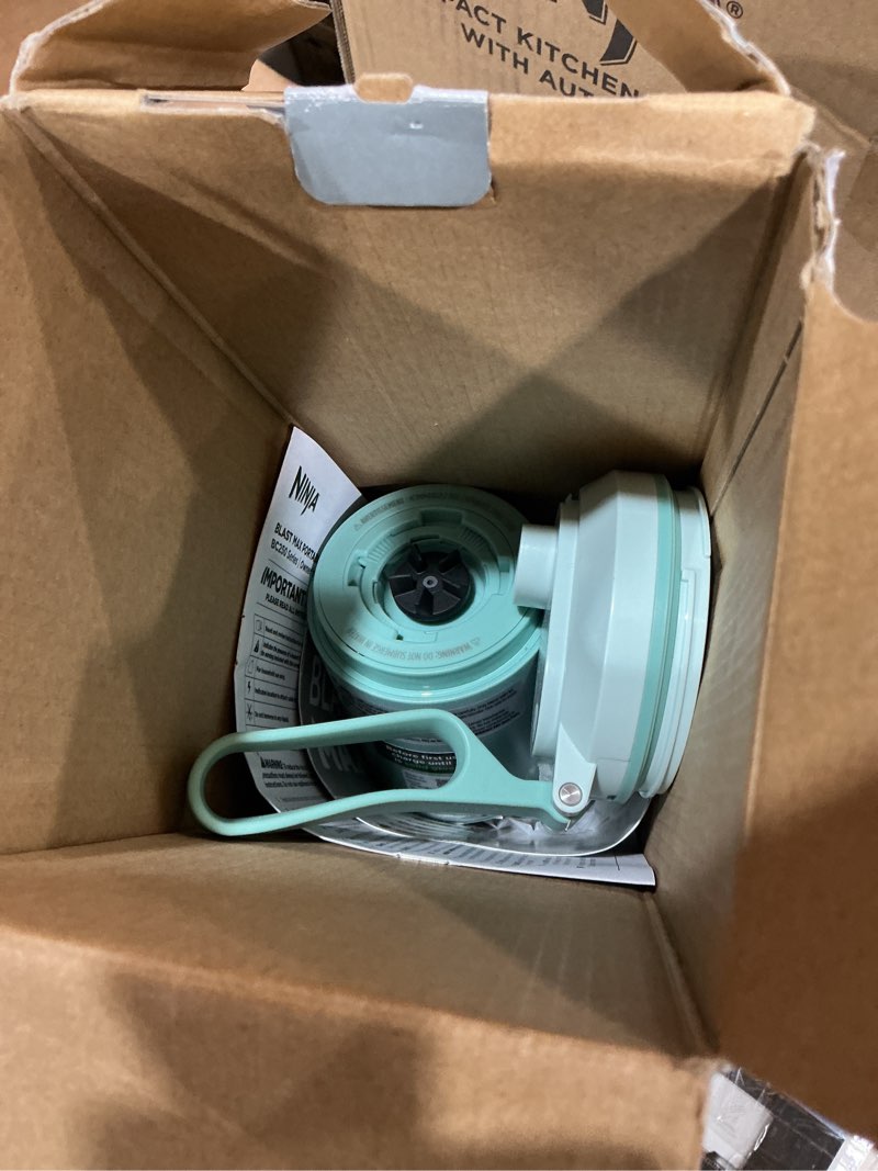 Condition photo showing As Is for ninja blast max, portable blender + twist & go, personal smoothie, blend, ice crush, 3 programs, cordless, 22oz removable vessel, dishwasher safe, leakproof, sea glass, bc251mt sea glass 22 oz.