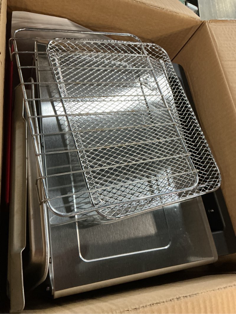 Condition photo showing As Is for Gourmia Toaster Oven Digital Air Fryer - Convection Mode with 4 Slice Capacity, 3 Rack Positions, 12 Presets, Toast, Bagel, Bake, Roast, Broil, Dehydrate, Popcorn, Fits 9" Pizza, Stainless Steel Large Silver