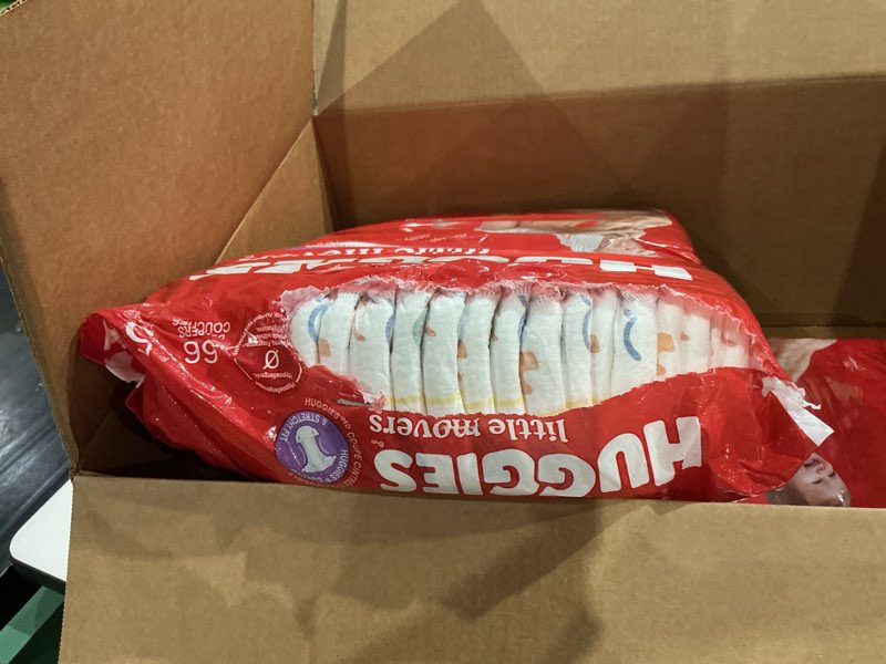 Condition photo showing As Is for huggies size 5 diapers, little movers baby diapers, size 5 (27+ lbs), 132 count (2 packs of 66), packaging may vary size 5 132