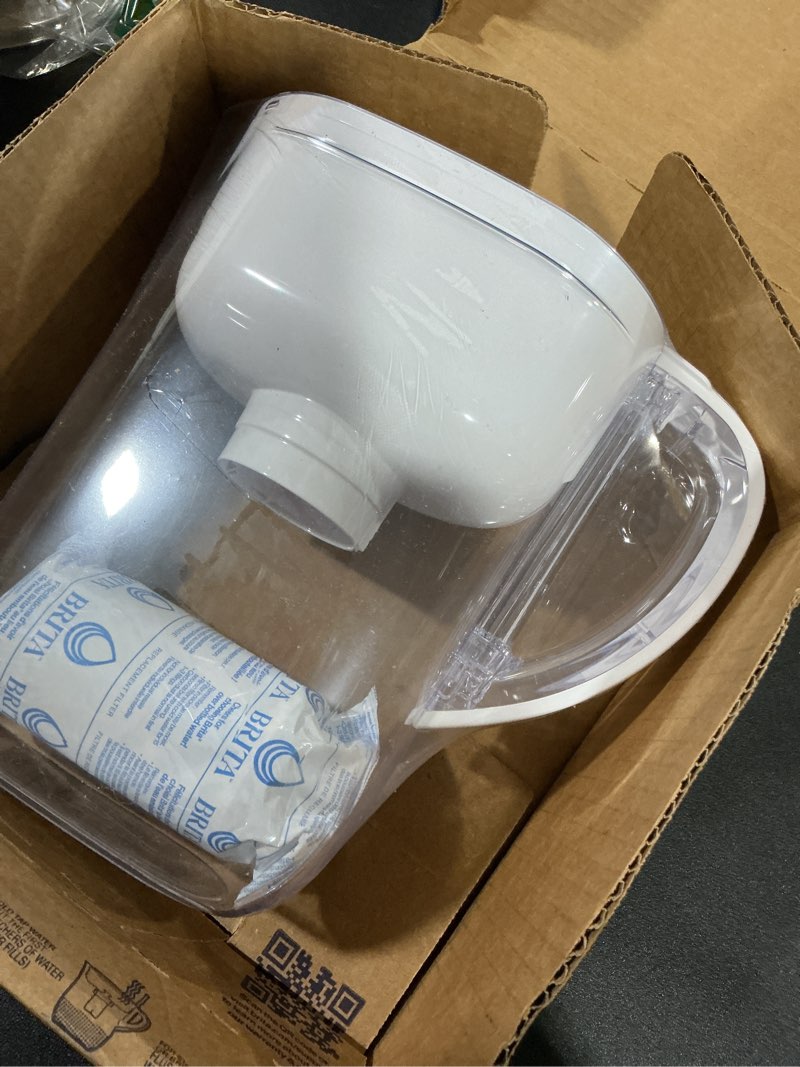 Condition photo showing New/Like New for Brita Metro Water Filter Pitcher with SmartLight Change Indicator, BPA-Free, Replaces 1,800 Plastic Water Bottles a Year, Lasts Two Months, Includes 1 Filter, Small - 6-Cup Capacity, White Standard White