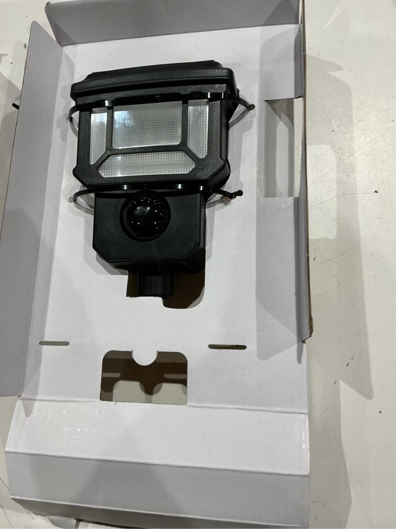 Condition photo showing As Is for harbor breeze 200 -lumens matte black solar led outdoor path light with motion sensor 5000-k