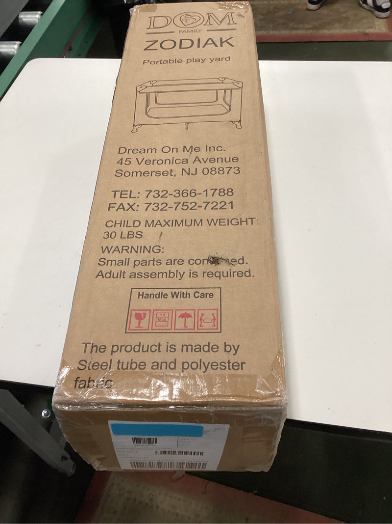 Condition photo showing New/Like New for Dream On Me Zodiak Portable Playard in Coffee and Blue, Lightweight, Packable and Easy Setup Baby Playard, Breathable Mesh Sides and Soft Fabric - Comes with a Removable Padded Mat Coffee/Blue