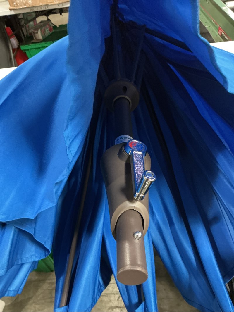 Condition photo showing New/Like New for patio umbrella with hand crank blue (unknown size)