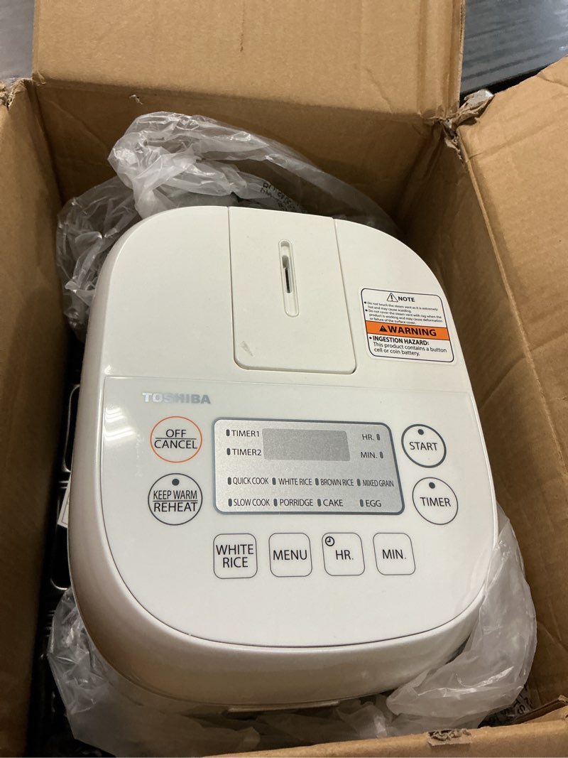 Condition photo showing As Is for toshiba mini rice cooker, 3 cups uncooked small rice cooker, steamer & warmer, with fuzzy logic and one-touch cooking, 24 hour delay timer and auto keep warm feature, white