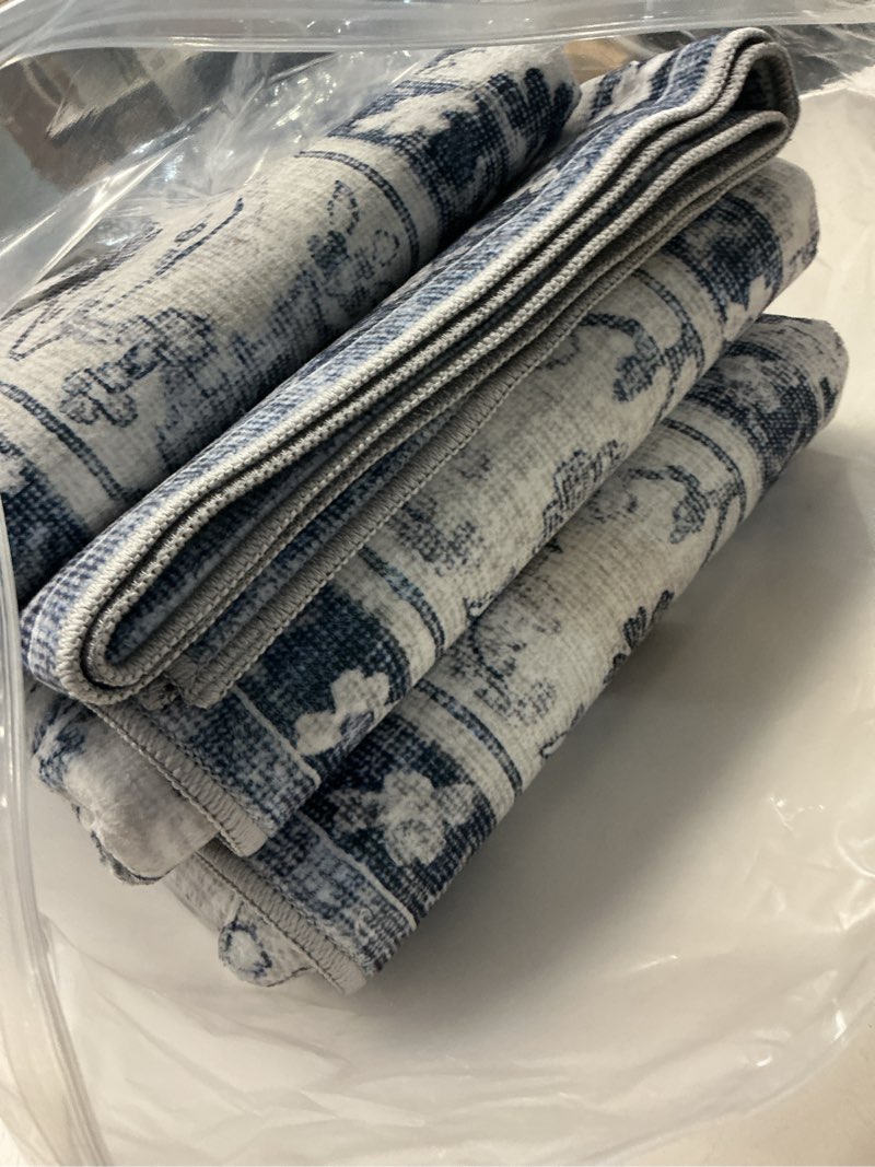 Condition photo showing New/Like New for xilixili area rug 6x9 - anti-slip backing washable rug - stain resistant rugs for living room,bedroom & dining room,vintage printed area rugs (navy blue,6'x9')