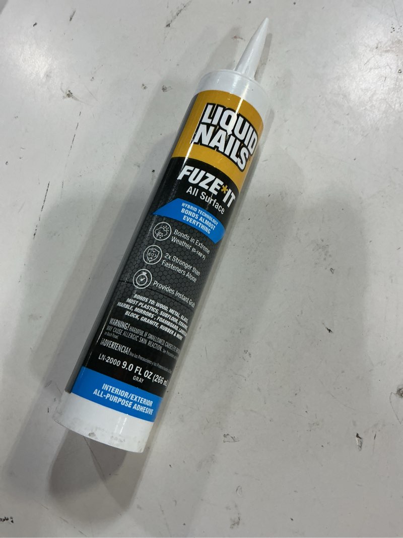 Condition photo showing New/Like New for liquid nails ln-2000 6 pack 9 oz. fuze it all surface construction adhesive, gray