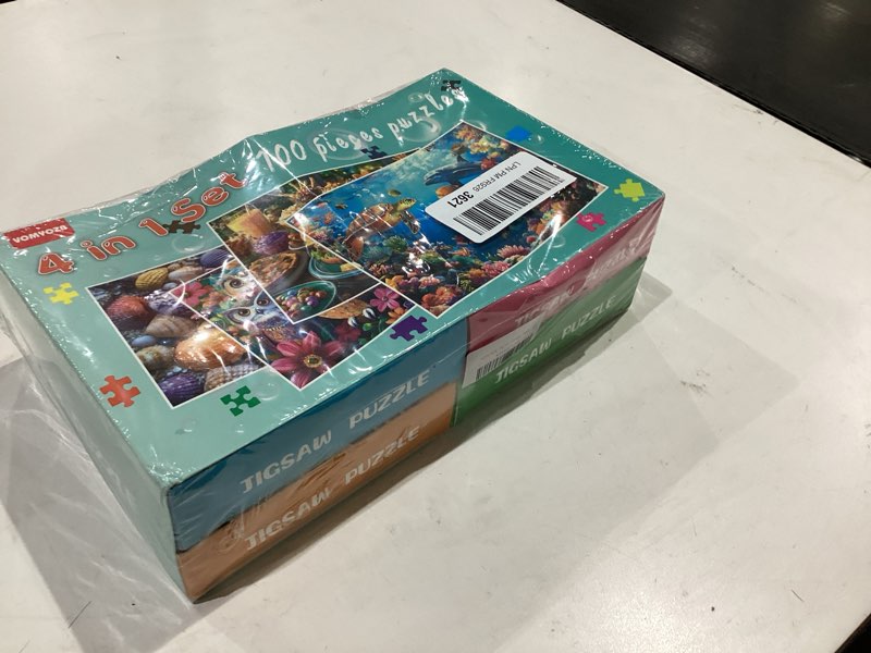 Condition photo showing New/Like New for 4 packs 100 piece puzzles for kids ages 4-6, jigsaw puzzles for kids ages 6-8 8-10 sea world, owls, hamburger, starfish learning educational toys for boys and girls