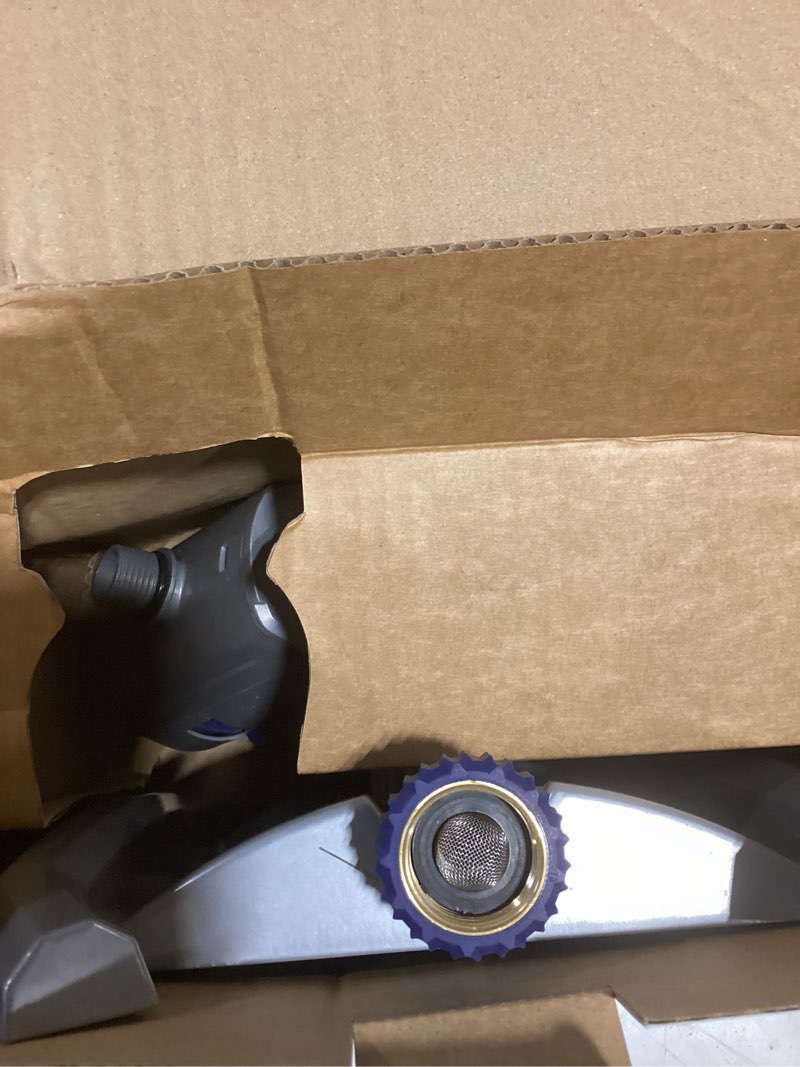 Condition photo showing As Is for orbit max 3900-sq ft oscillating sled lawn sprinkler